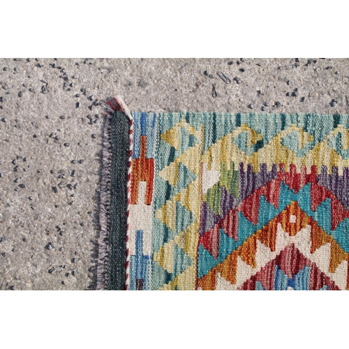 560A - Hand knotted woollen Chobi Kilim rug, 150cm long x 100cm wide