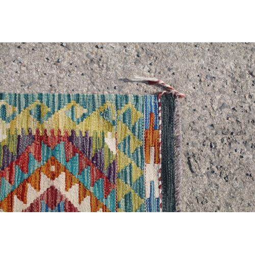 560A - Hand knotted woollen Chobi Kilim rug, 150cm long x 100cm wide