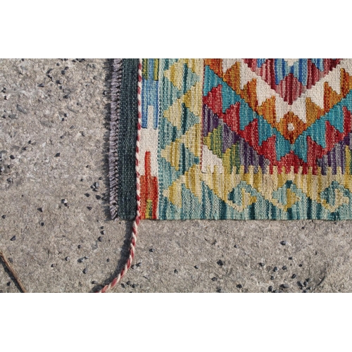 560A - Hand knotted woollen Chobi Kilim rug, 150cm long x 100cm wide