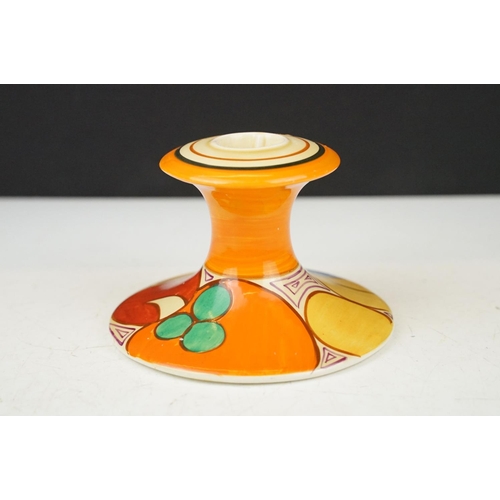 2 - Clarice Cliff for Newport Pottery - A Fantasque Bizarre range candlestick raised on a circular foot,... 