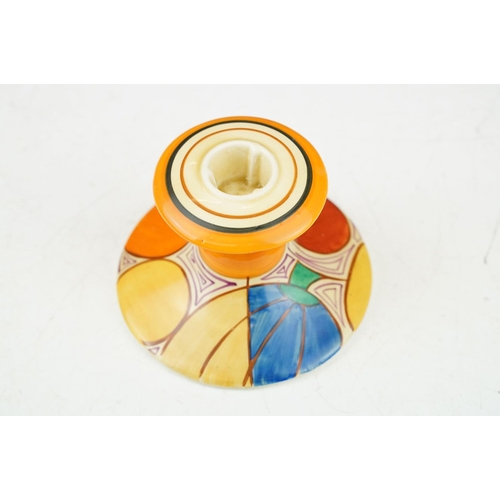 2 - Clarice Cliff for Newport Pottery - A Fantasque Bizarre range candlestick raised on a circular foot,... 