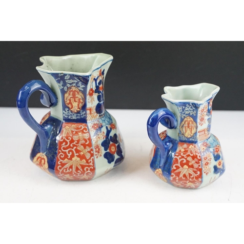 23 - 19th century set of four Ironstone China octagonal jugs decorated in the Imari palette, heights rang... 