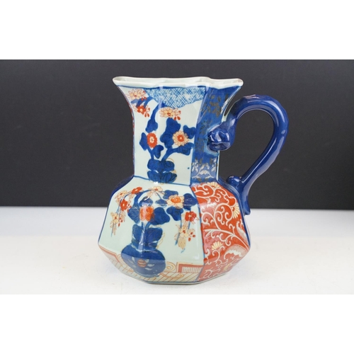 23 - 19th century set of four Ironstone China octagonal jugs decorated in the Imari palette, heights rang... 