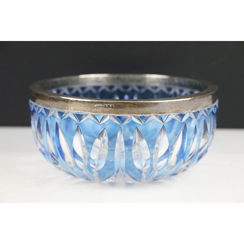 24 - Early-to-mid 20th century blue flash cut glass circular bowl with silver hallmarked rim, London 1931... 
