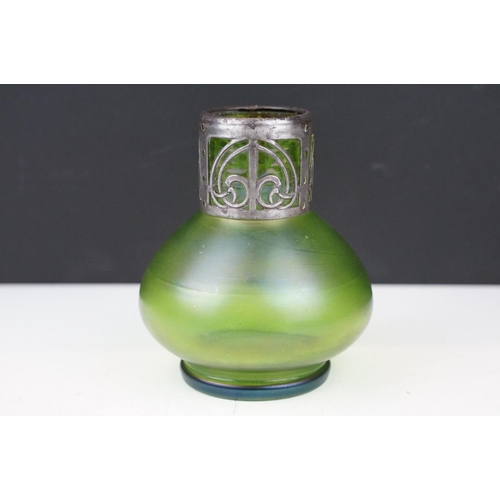 3 - Art Nouveau green iridescent glass vase, of squat baluster form, with pierced white metal mount to n... 