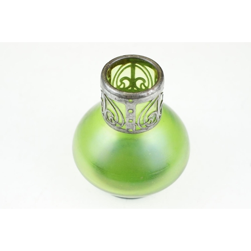 3 - Art Nouveau green iridescent glass vase, of squat baluster form, with pierced white metal mount to n... 