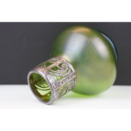 3 - Art Nouveau green iridescent glass vase, of squat baluster form, with pierced white metal mount to n... 