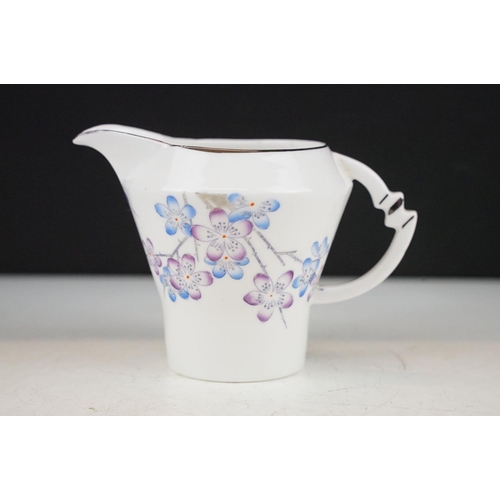 43 - Royal Albert 'Blackthorn' tea set to include 6 cups & saucers, 6 tea plates, milk jug, sugar bowl & ... 