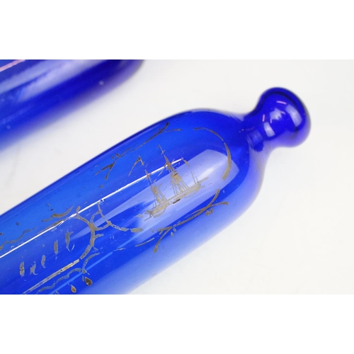 48 - Two 19th century Bristol blue glass rolling pins, one with sailing themed detail & inscription, long... 