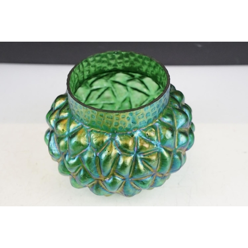 56 - Two early 20th century Kralik iridescent glass rose bowls to include a green glass textured example ... 
