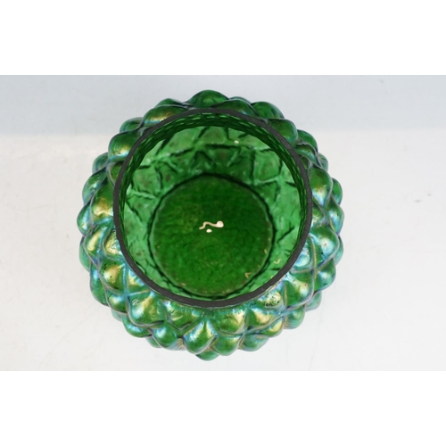 56 - Two early 20th century Kralik iridescent glass rose bowls to include a green glass textured example ... 