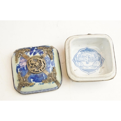 59 - Four Chinese porcelain trinket boxes with white metal mounts depicting dragons, birds & butterflies,... 
