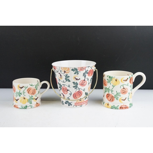 63 - A collection of three Emma Bridgewater Halloween pumpkin pattern items to include a 1/4 pint mug (Fi... 