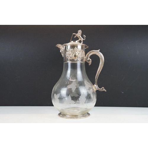 68 - Etched glass claret jug with silver plated fittings, approx 30cm tall