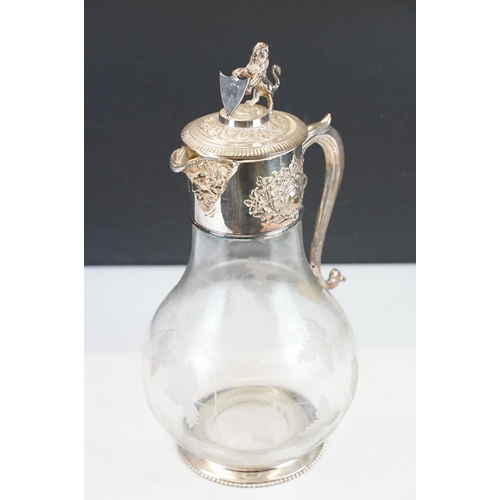 68 - Etched glass claret jug with silver plated fittings, approx 30cm tall