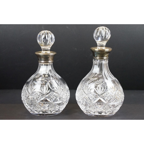 76 - Two pairs of late 20th century cut glass decanters with silver hallmarked collars, circa 1990's (tal... 