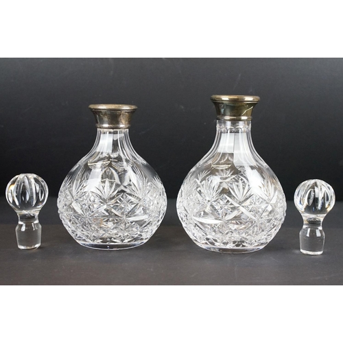 76 - Two pairs of late 20th century cut glass decanters with silver hallmarked collars, circa 1990's (tal... 