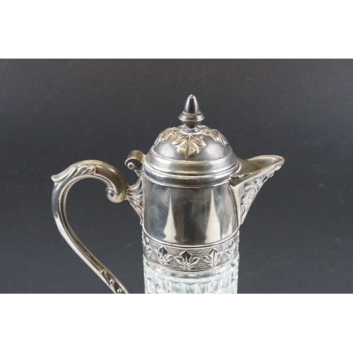 362 - Moulded glass & silver plated claret jug (approx 30cm high), together with a bronzed resin figure of... 