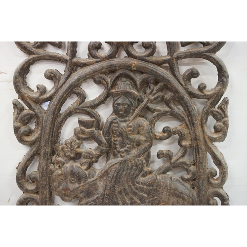 367 - Antique Indian cast iron wall panel featuring a Goddess Durga riding a tiger within a pierced scroll... 