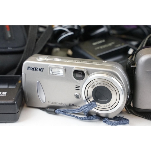 376 - A small quantity of photographic equipment to include cameras and video cameras