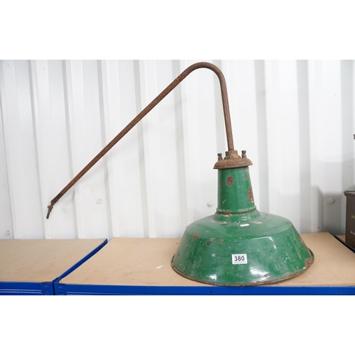 380 - A mid century industrial green enamel lamp by Revo.
