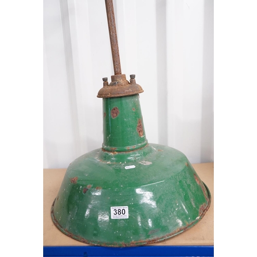 380 - A mid century industrial green enamel lamp by Revo.