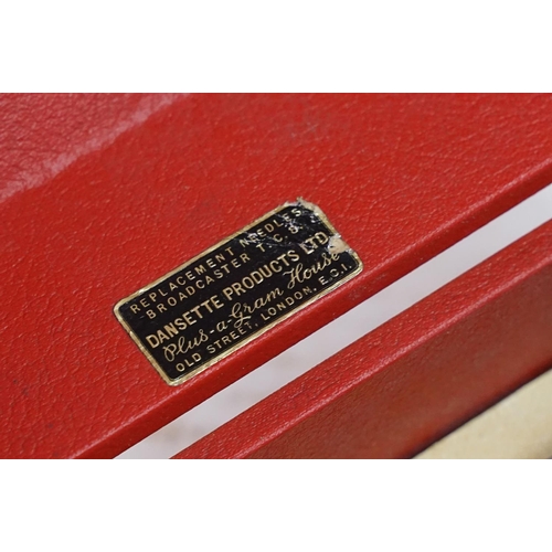 386 - A mid 20th century Dansette red table top record player together with a Pye black box wooden cased e... 