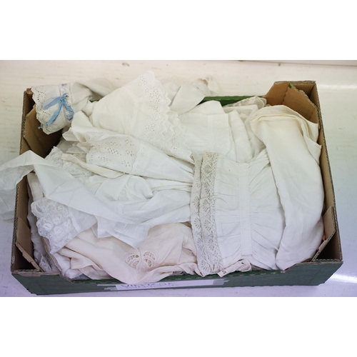 403 - Five boxes of linen and textiles to include: lace, Christening gowns, baby clothes, gloves, bags, li... 