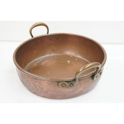 413 - Large copper shallow pan, with two brass handles, 12cm high (excluding handles), 41cm diameter (excl... 