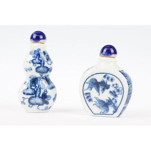 49 - Two Chinese blue and white ceramic snuff bottles with traditional Chinese decoration.