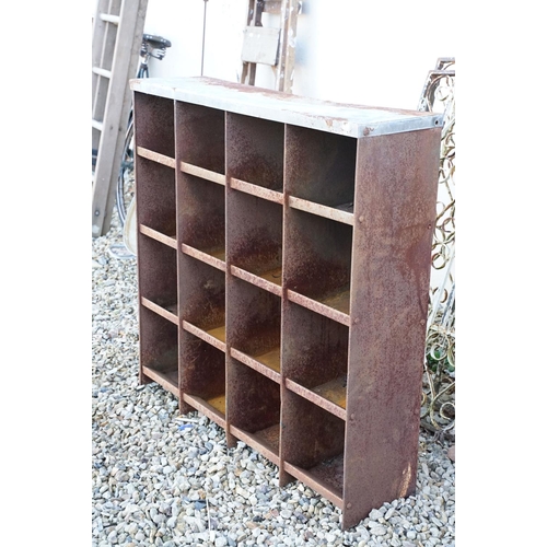 509 - Weathered metal cabinet with 16 pigeon holes, approx 90cm H x 91cm W