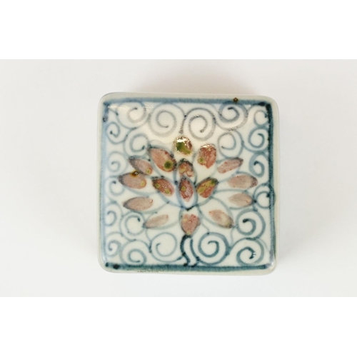 51 - A Chinese blue and white ceramic trinket box with traditional blue and white decoration together wit... 