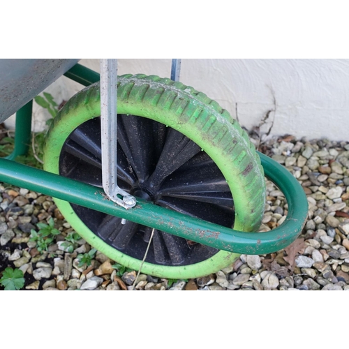 511 - Contemporary metal wheel barrow, measures approx 137cm long