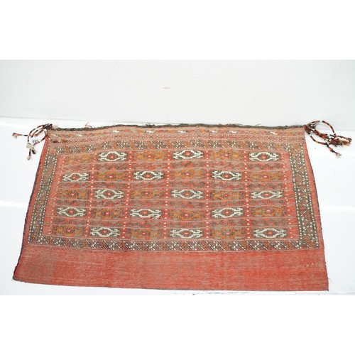 588 - Pair of large Afghan woven carpet saddle bags each with geometric detailing and woven tassels. Measu... 