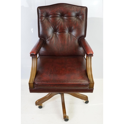 519 - Red leather adjustable height captain's chair, with button back, 107cm high x 60cm wide x 70cm deep ... 