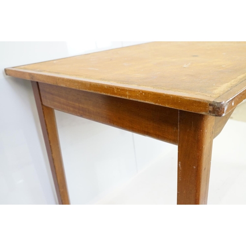 533 - Mid century mahogany table on square tapering legs (lacking inset top), 76cm high x 121cm wide x 76c... 