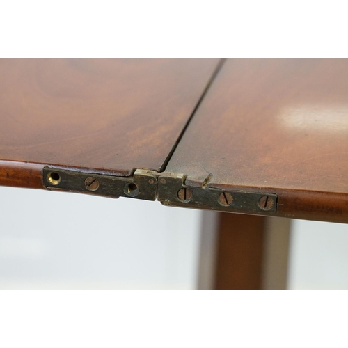 536 - William IV mahogany games table, top swivels to reveal enclosure, partially green baize lined, on ta... 