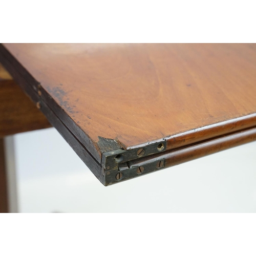 536 - William IV mahogany games table, top swivels to reveal enclosure, partially green baize lined, on ta... 