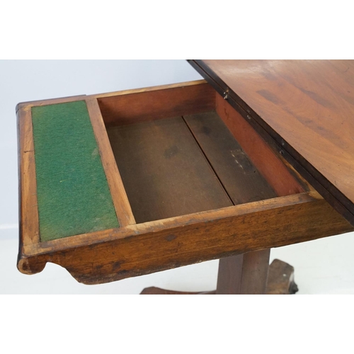 536 - William IV mahogany games table, top swivels to reveal enclosure, partially green baize lined, on ta... 