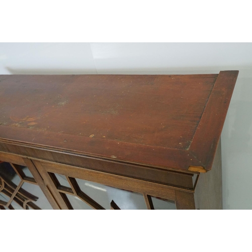 544 - 20th century mahogany astragal glazed two door display cabinet fitted with three shelves, 107cm high... 