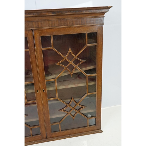 544 - 20th century mahogany astragal glazed two door display cabinet fitted with three shelves, 107cm high... 