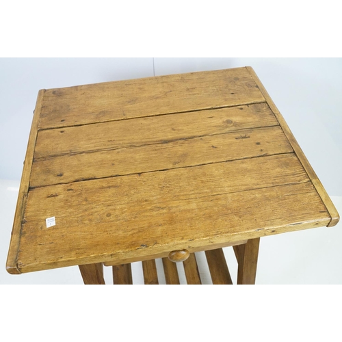 553A - Early vintage pine work table with underslung drawer and pot shelf below, 81.5cm high x 75cm wide x ... 