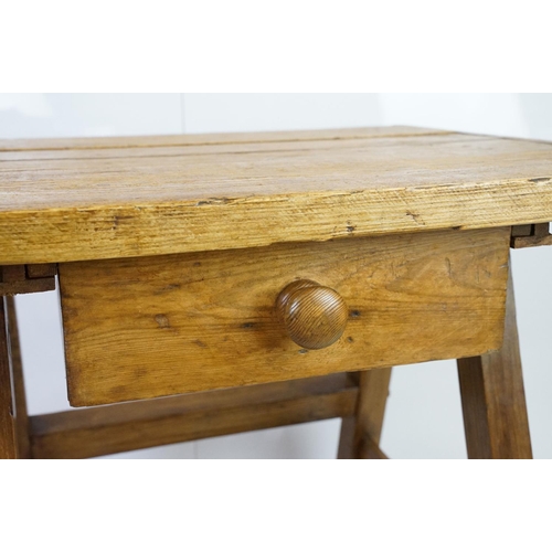 553A - Early vintage pine work table with underslung drawer and pot shelf below, 81.5cm high x 75cm wide x ... 