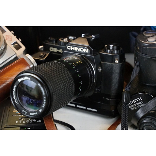 388A - A collection of mixed photographic equipment to include Zenit and Chinon 35mm SLR cameras together w... 