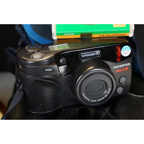 388A - A collection of mixed photographic equipment to include Zenit and Chinon 35mm SLR cameras together w... 