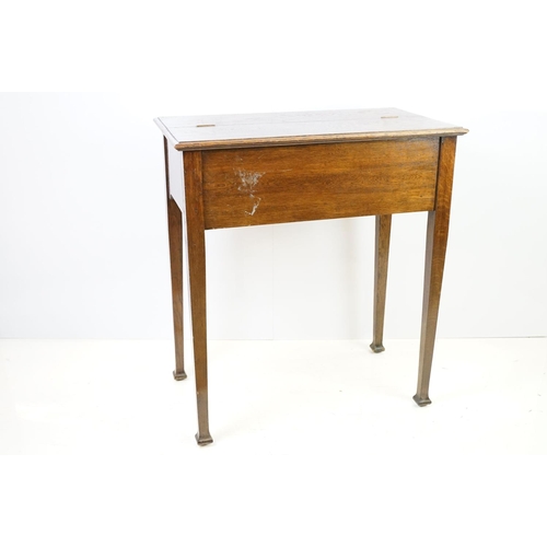 546 - 20th century oak fall front desk, with fitted stationery enclosure, on square tapering legs, with ke... 