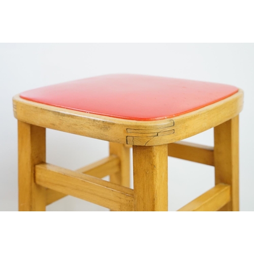 547 - Pair of vintage kitchen high stools, with red leatherette padded seats, each 72.5cm high x 33cm wide... 