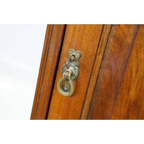 555 - 20th century mahogany hanging wall cabinet, with panelled door above carved bracket base, the interi... 