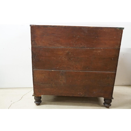 556 - Victorian mahogany chest of two short and three long drawers, with turned handles on turned bun feet... 