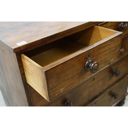 556 - Victorian mahogany chest of two short and three long drawers, with turned handles on turned bun feet... 